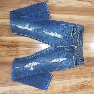 Premiere distressed skinny jeans